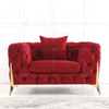 Modernes Sofa aus getuftetem Stoff mit goldenen Beinen